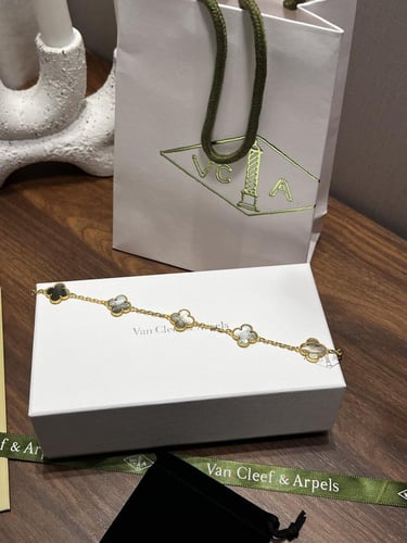 إسوارة Van cleef ذهبي - فيروزي