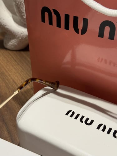 نظارة MIU MIU أطار ذهبي - عدسة بني
