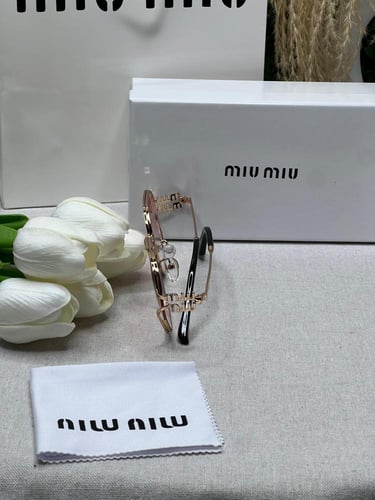 نظارة MIU MIU - اطار ذهبي- عدسه وردي