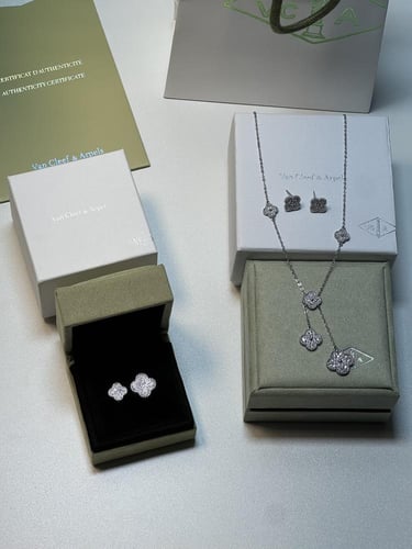 طقم van cleef فضي سلسال + خاتم