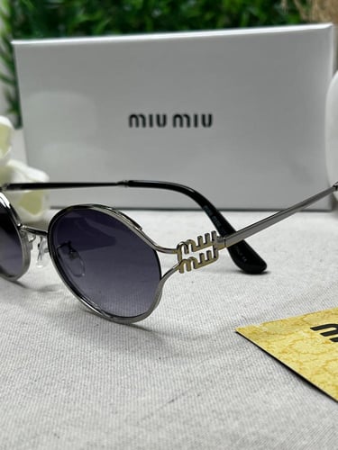 نظارة MIU MIU أطار فضي عدسه مدرج