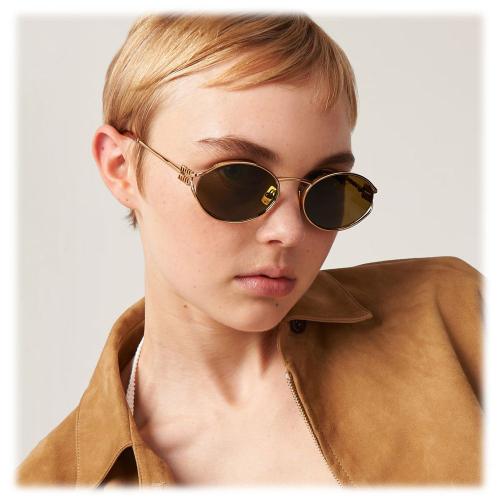 نظارة MIU MIU أطار ذهبي - عدسة بني