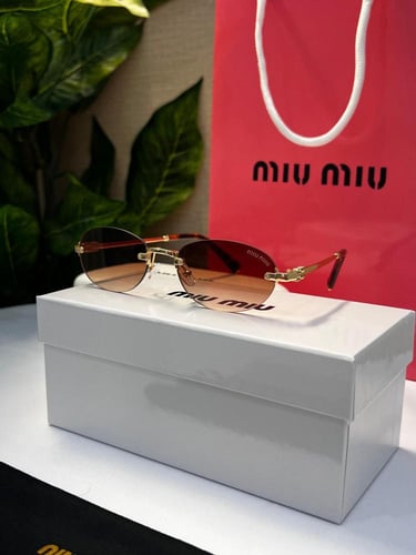 نظارة miu miu أطار ذهبي عدسة بني مدرج