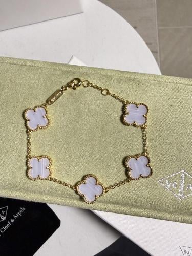 إسوارة Van cleef ذهبي - فيروزي مخطط