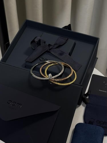 إسوارة داينتي apm ( فضي -ذهبي )