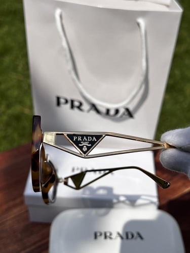 نظارة PRADA تايقر عدسة شفافه
