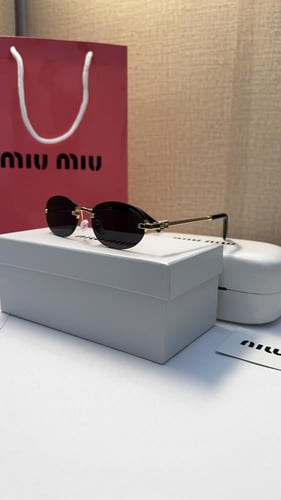 نظارة miu miu أطار ذهبي عدسة أسود