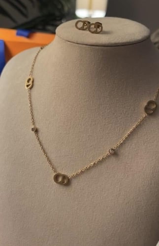 سلسال + حلق Dior معدن ذهبي