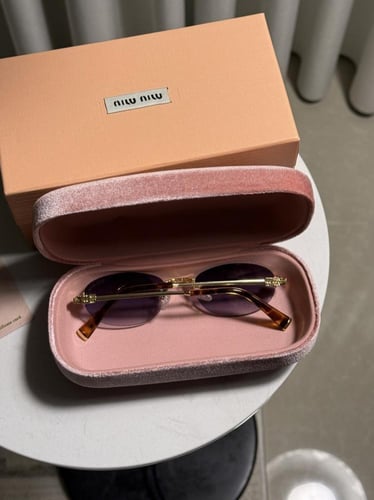 نظارة MIU MIU اطار ذهبي تايقر عدسة مدرج