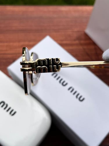 نظارة miu miu-إطار ذهبي - عدسة بني مدرج