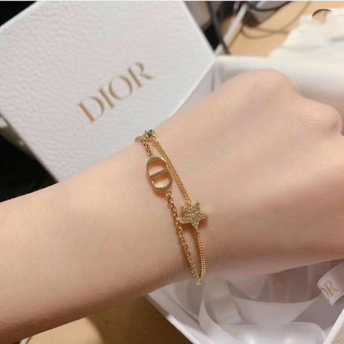 اسوارةDior الذهبي