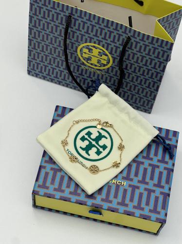 إسوارة TORY BURCH معدن ذهبي بفصوص ماستر كواليتي