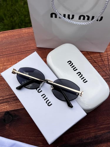 نظارة miu miu أطار ذهبي - عدسة اسود