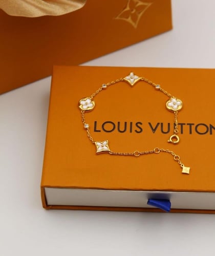 إسوارة LOUIS VUITTON معدن ذهبي لؤلؤي