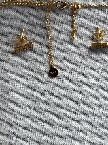 طقم FENDI معدن ذهبي