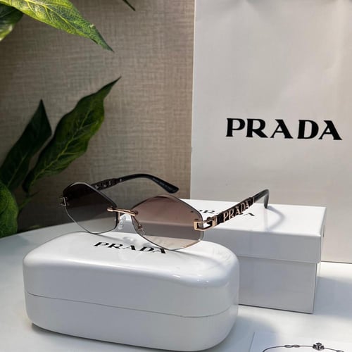 نظارة PRADA إطار أسود- عدسة بني مدرج