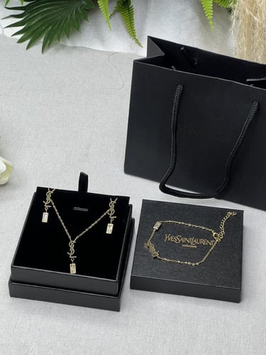 طقم سان لوران ذهبي