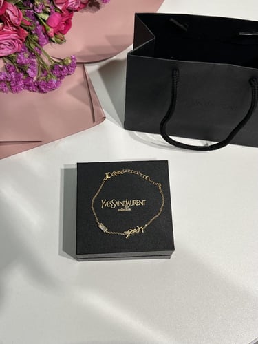 إسوارة سان لوران ذهبي