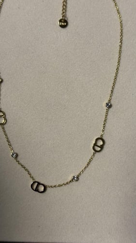 سلسال + حلق Dior معدن ذهبي