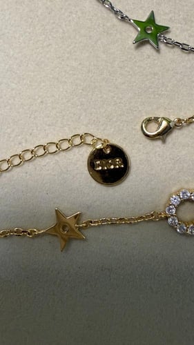 إسوارة Christian Dior لونين ( ذهبي-فضي )