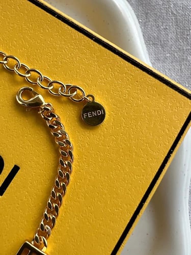 طقم FENDI معدن ذهبي