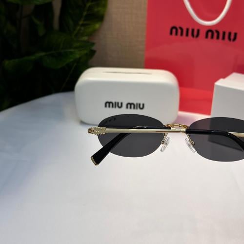 نظارة miu miu أطار ذهبي عدسة أسود