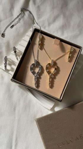 سلسال BVLGARI ذهبي - فضي