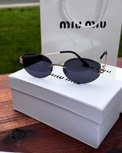 نظارة miu miu أطار ذهبي - عدسة اسود