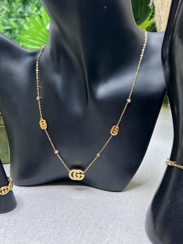 طقم GUCCI ذهبي