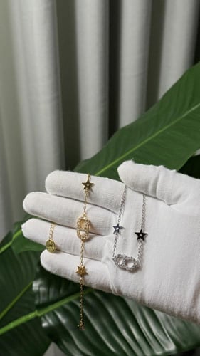 إسوارة Christian Dior لونين ( ذهبي-فضي )