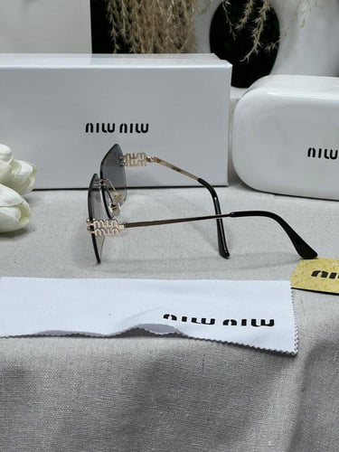 نظارة - MIU MIU