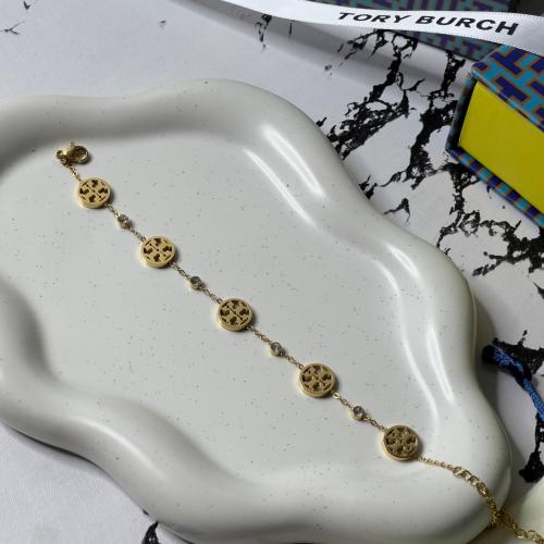 إسوارة TORY BURCH معدن ذهبي بفصوص