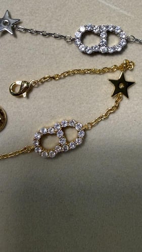 إسوارة Christian Dior لونين ( ذهبي-فضي )