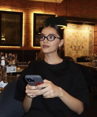 نظارة MIU MIU بيضاوي - أطار اسود عدسة شفافة