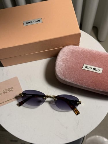 نظارة MIU MIU اطار ذهبي تايقر عدسة مدرج