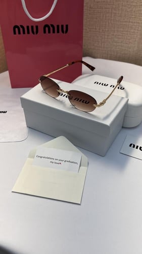 نظارة miu miu أطار ذهبي عدسة بني مدرج