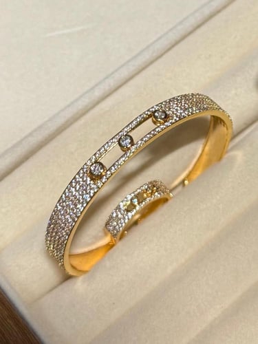 اسوارة مع خاتم MESSIKA معدن ذهبي