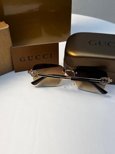 نظارة gucci - إطار ذهبي - عدسة بني مدرج