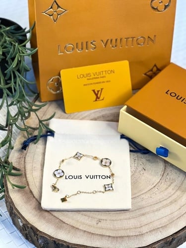 إسوارة LOUIS VUITTON معدن ذهبي لؤلؤي