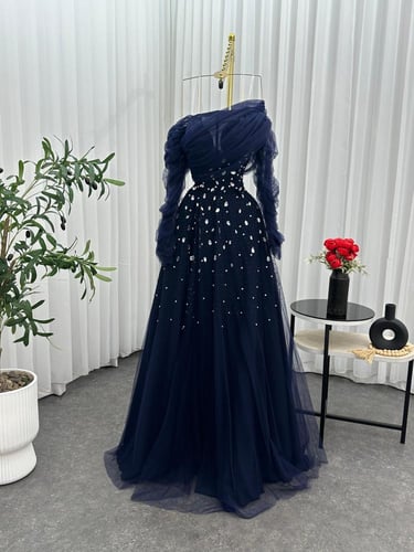 فستان سهرة راقي تل بعده الوان