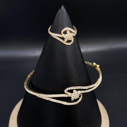 أسوارة مع الخاتم ذهب عيار 18 الوزن 6.9 جرام