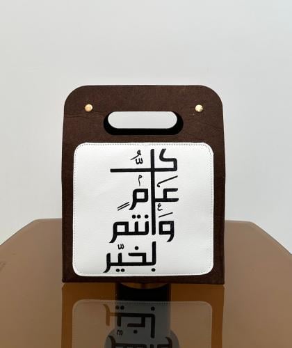 حامل نباتات بمعايدة
