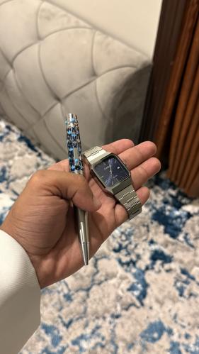 ساعة وقلم فضي بيبسي