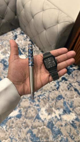 ساعة وقلم أسود كامل