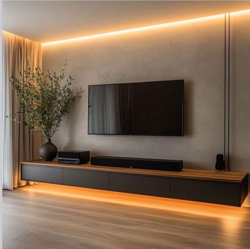 طاولة تلفزيون مع اضاءة بتصميم مودرن