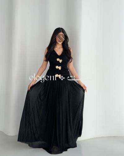 طقم سهرة أسود بكسرات ناعمة وتزيين فراشات ذهبية | ت...