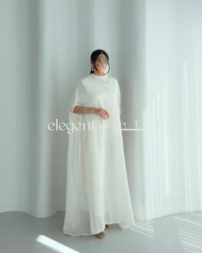 جلابية مذهلة بلمعة لؤلؤية وتصميم ناعم فخم