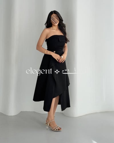 فستان أسود ناعم بقصة توب وطول متفاوت