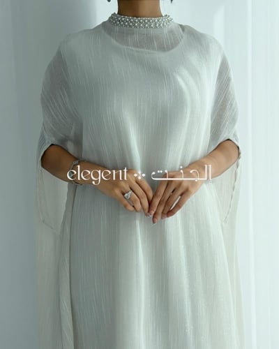 جلابية مذهلة بلمعة لؤلؤية وتصميم ناعم فخم