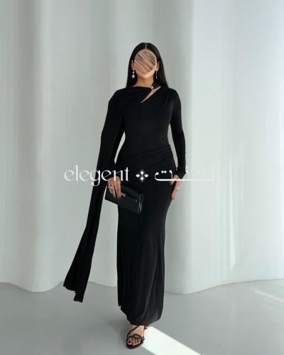 فستان سهرة أسود استرتش بلمسة وشاح ملكي وانسياب فاخ...